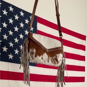 Myra cowhide fringe crossbody bag 🤍🤎